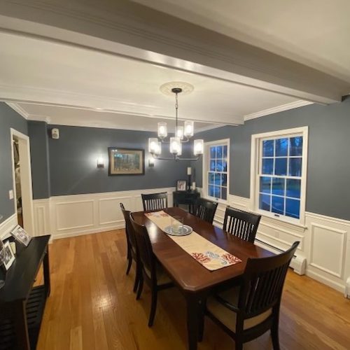 Blue walls white trim dining room