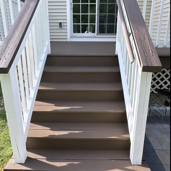 Finished deck in Brookline. Dark brown.