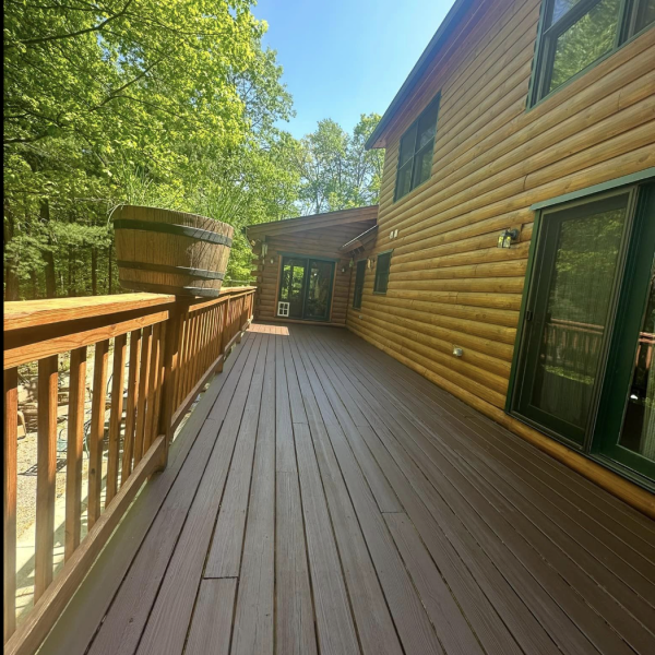 Final result log cabin deck stained in Norfolk MA